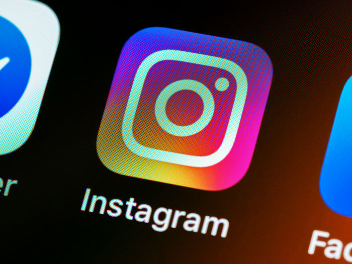 Instagram app icon on a smartphone screen, showcasing social media.