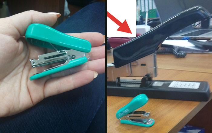 Small stapler on a desk next to a large stapler; a funny office comparison highlighting good-funny-bosses.