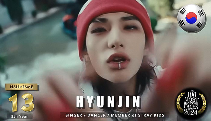 Hyunjin ranked among the most handsome men of 2024, wearing a red beanie and lip ring.