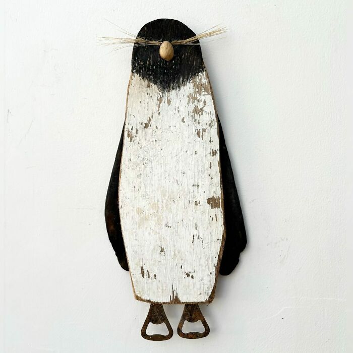 Driftwood animal sculpture resembling a penguin with rustic, weathered wood finish by Kirsty Elson.