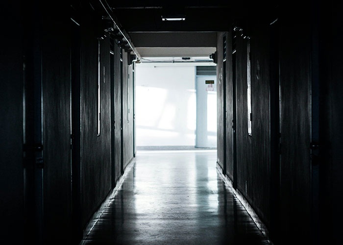 Dimly lit hospital hallway creating a cinematic atmosphere.