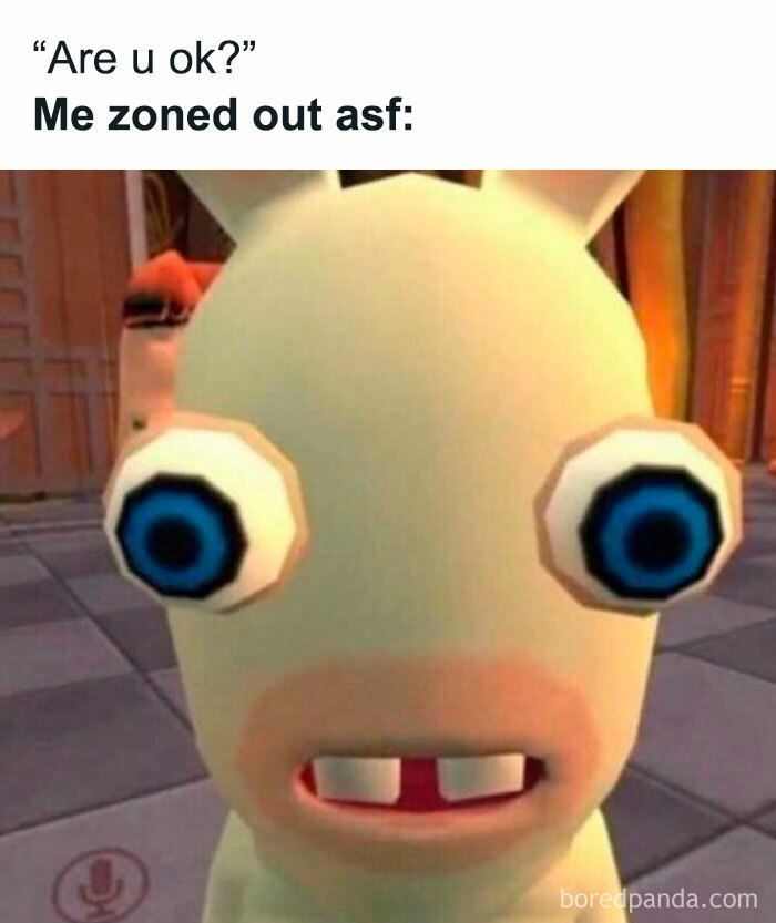 Close-up of a cartoon character with wide eyes, representing introverted and anxious feelings.