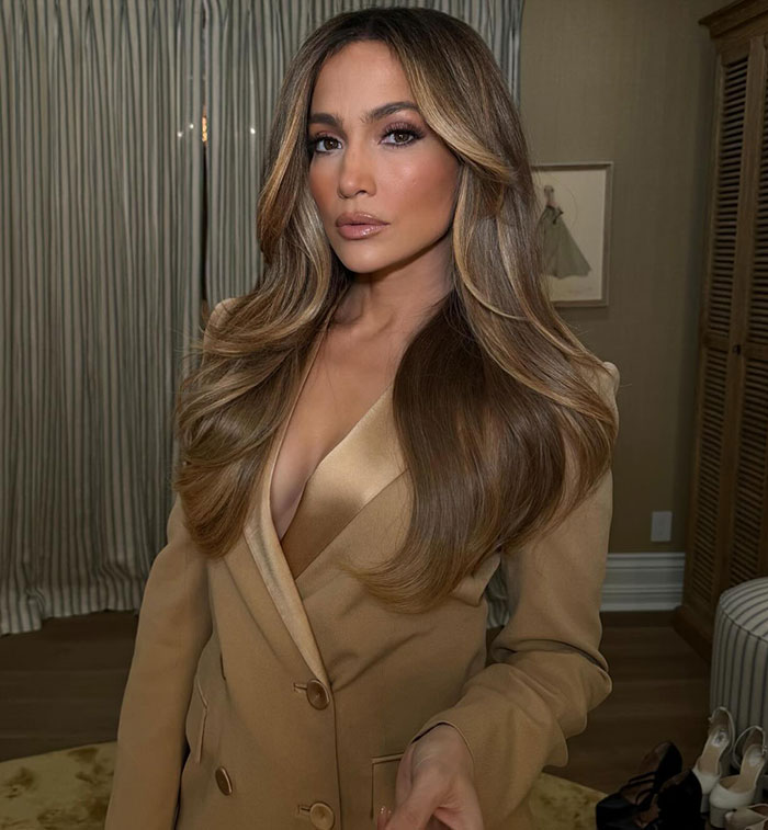 Jennifer Lopez in a stylish beige blazer, showcasing her elegant look for a dinner outing.