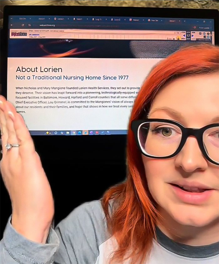 Woman discussing issues with Luigi Mangione's family nursing facilities, with a computer screen in the background.
