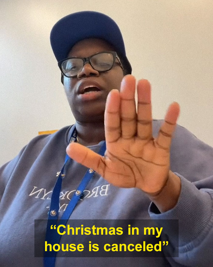 Mom raising hand, saying "Christmas in my house is canceled" after teacher's report on child's behavior. Mom raising hand, saying "Christmas in my house is canceled" after teacher's report on child's behavior.