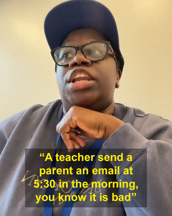 Person in glasses and cap discusses a teacher's email on child's behavior at school. Person in glasses and cap discusses a teacher's email on child's behavior at school.