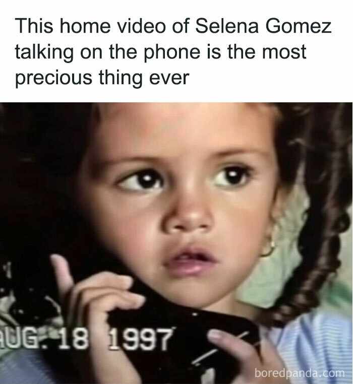 Young child on a phone, reminiscent of nostalgic childhood shows, dated August 18, 1997.