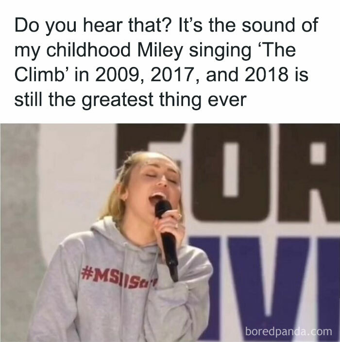 Singer performing, evoking nostalgic childhood shows memories.