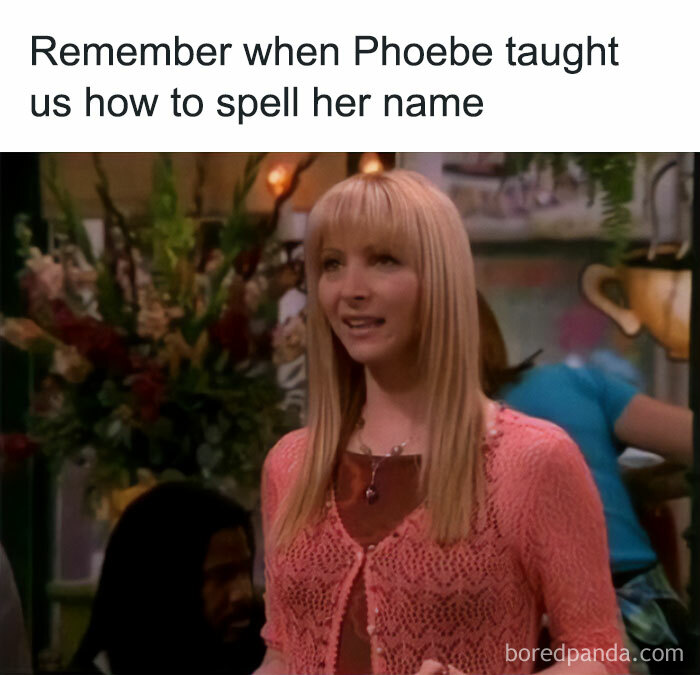 Woman in a nostalgic scene from a childhood show, smiling and standing indoors with plants in the background.