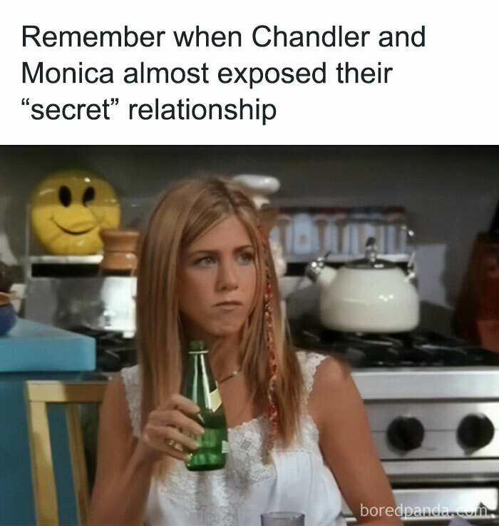 Woman drinking soda in a kitchen scene from nostalgic childhood shows.