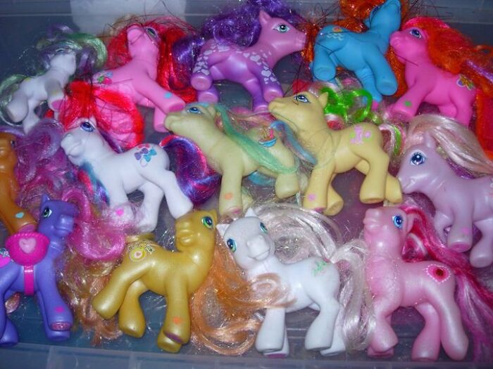 Collection of vintage My Little Pony toys with colorful manes, evoking an old-internet feel.