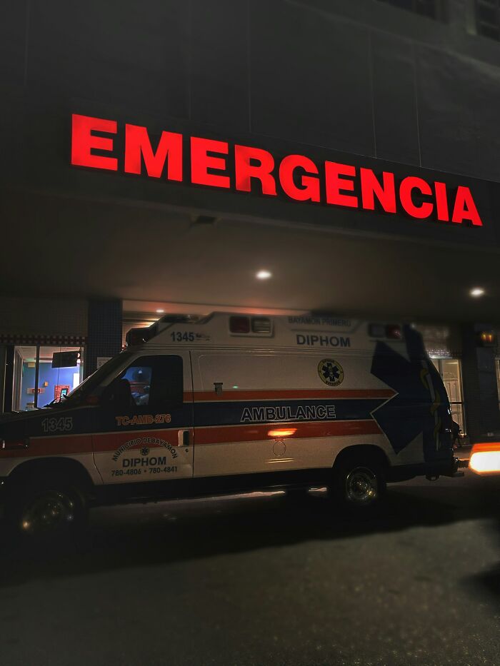 Ambulance outside an emergency room at night, highlighting a story of incredibly lucky people surviving against all odds.