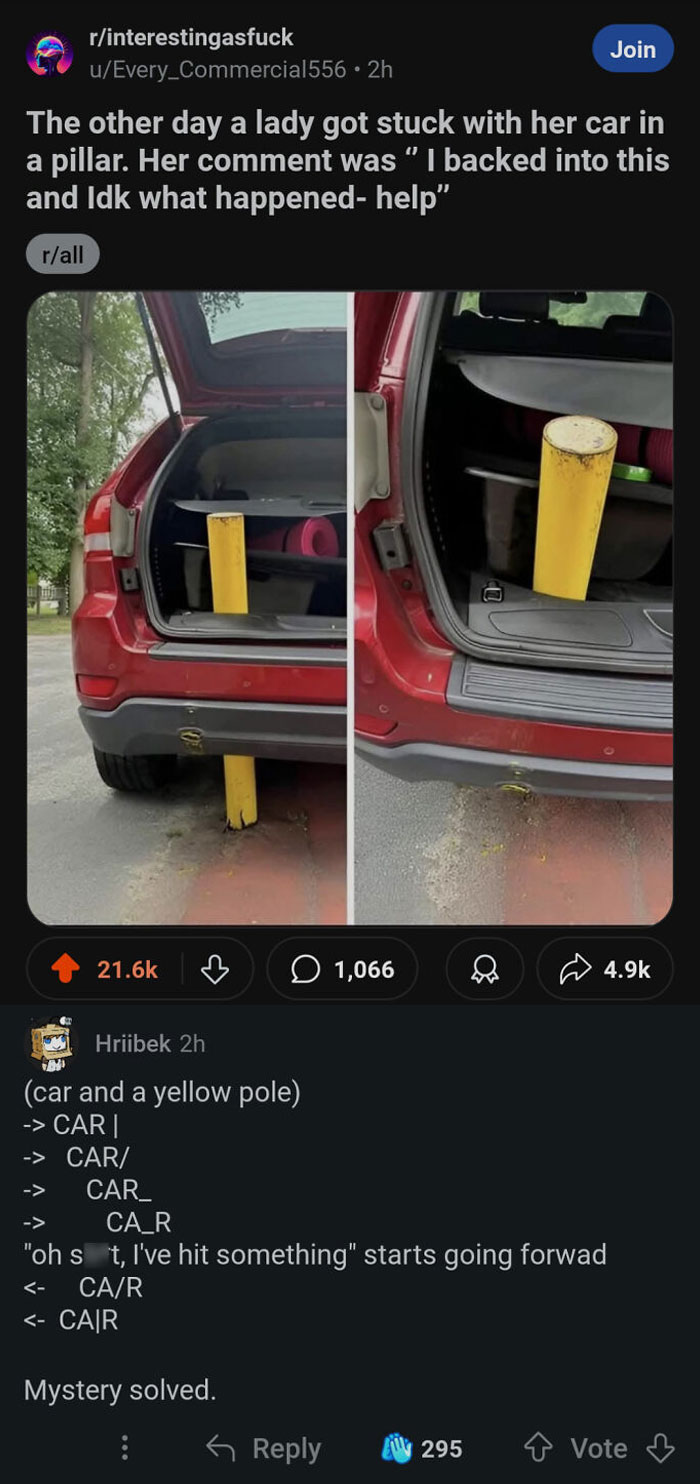 Car backed into a yellow pole, stuck in the rear bumper.