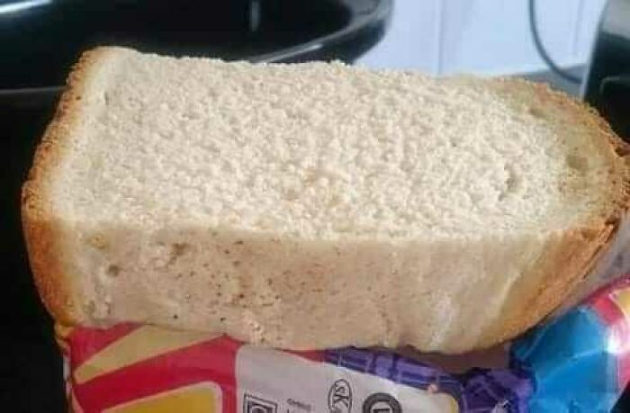 Oddly sliced thick bread slice, representing humorous Scottish culture.