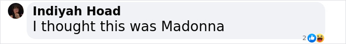 Text message mentioning someone thinks a picture is of Madonna.