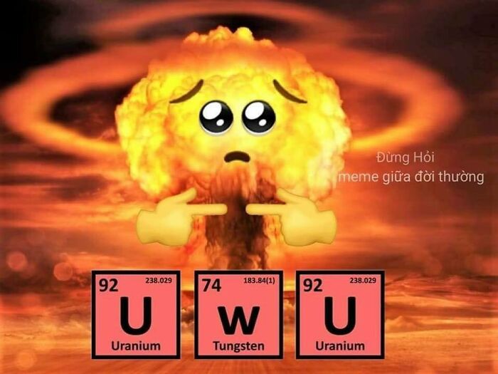 Cute face on a nuclear explosion, captioned with the chemical symbols for uranium and tungsten, creating a science meme.