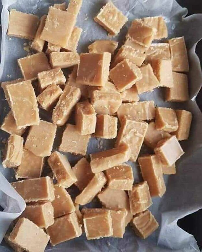 Scottish tablet pieces on parchment, showcasing traditional Scottish treats.