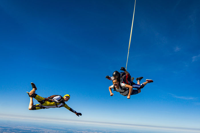 Friends Win $10K After One Ends Up In Hospital In Body Bag Before Going Skydiving Anyway