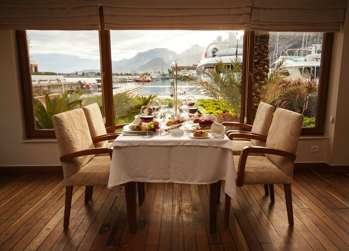 Luxurious dining setup by the marina.