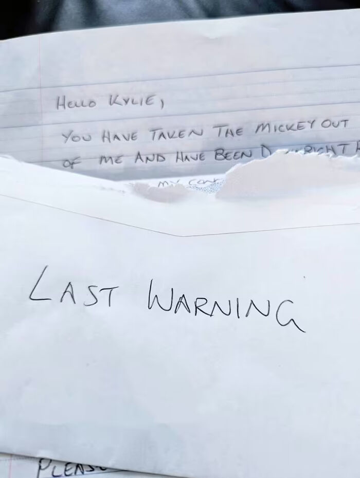 Handwritten letter with "Last Warning" envelope linked to vegan family and neighbor dispute over cooking meat. Handwritten letter with "Last Warning" envelope linked to vegan family and neighbor dispute over cooking meat.