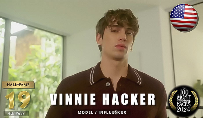 Model Vinnie Hacker listed in The Independent Critics' Most Handsome Men 2024, wearing a dark shirt indoors.