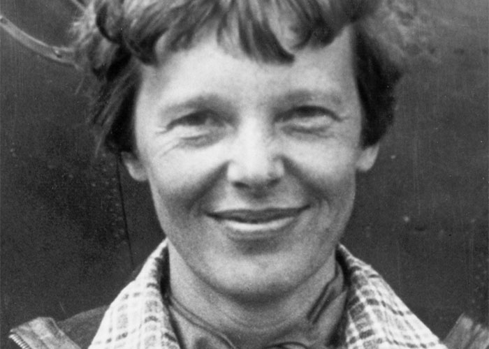 A person smiling in a black and white photo, representing a famous mystery.