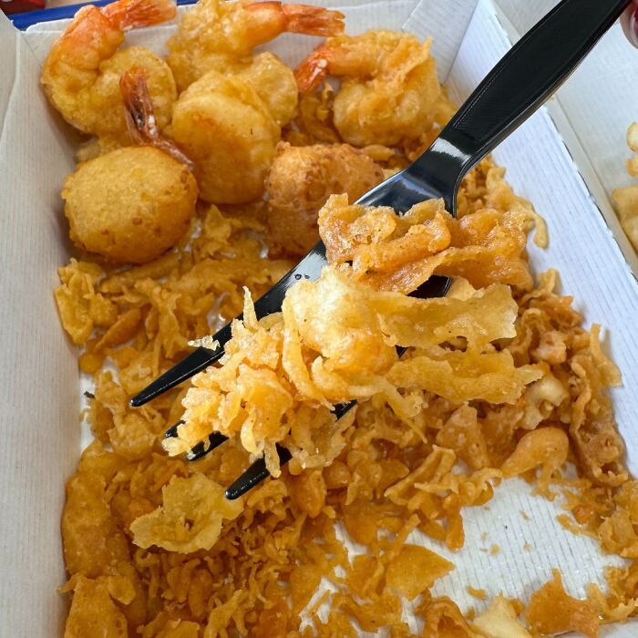 Bizarre fried food assortment in a takeout box, highlighting amusing online posts.