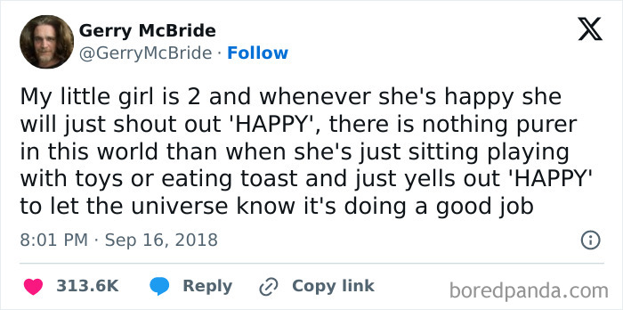 Wholesome tweet about a 2-year-old girl shouting "HAPPY" to express joy while playing or eating toast.