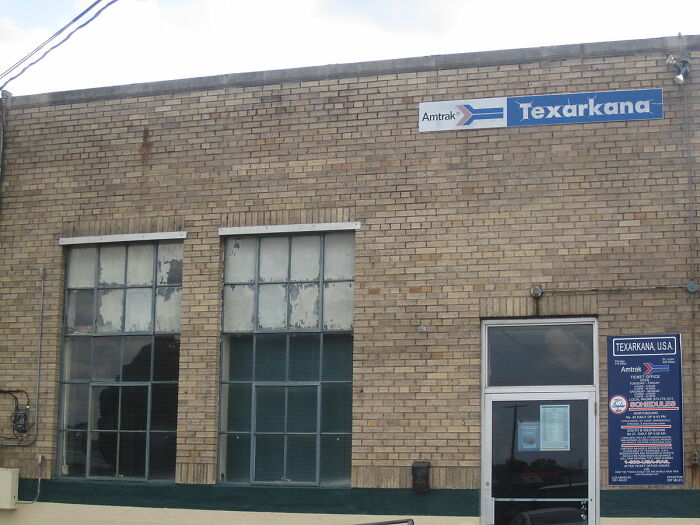 Texarkana Amtrak station, brick exterior, overcast sky, worst city country trip.