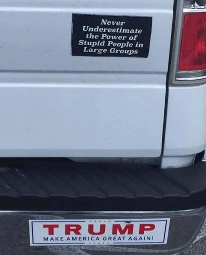 Two funny bumper stickers on a vehicle, one with a political theme.