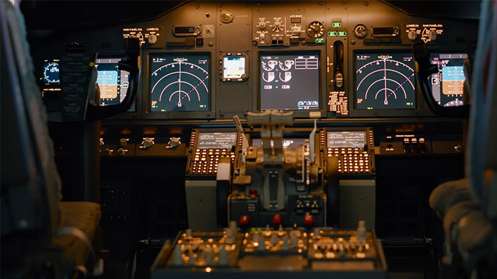 Cockpit controls of an airplane, representing high-earning professions.