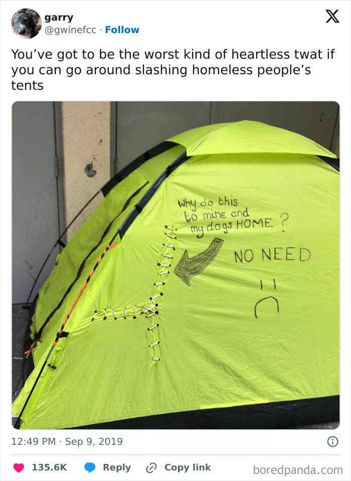 Damaged tent with a message criticizing people being jerks for slashing it, as shown in viral tweet.