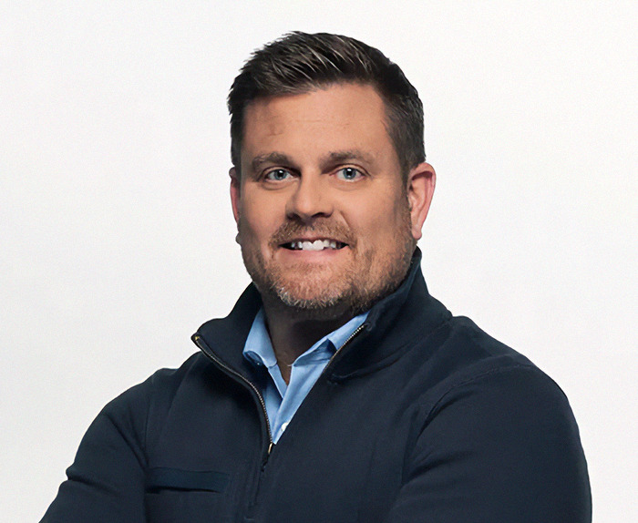 Portrait of a man in a navy jacket, related to UnitedHealth's CEO. Portrait of a man in a navy jacket, related to UnitedHealth's CEO.