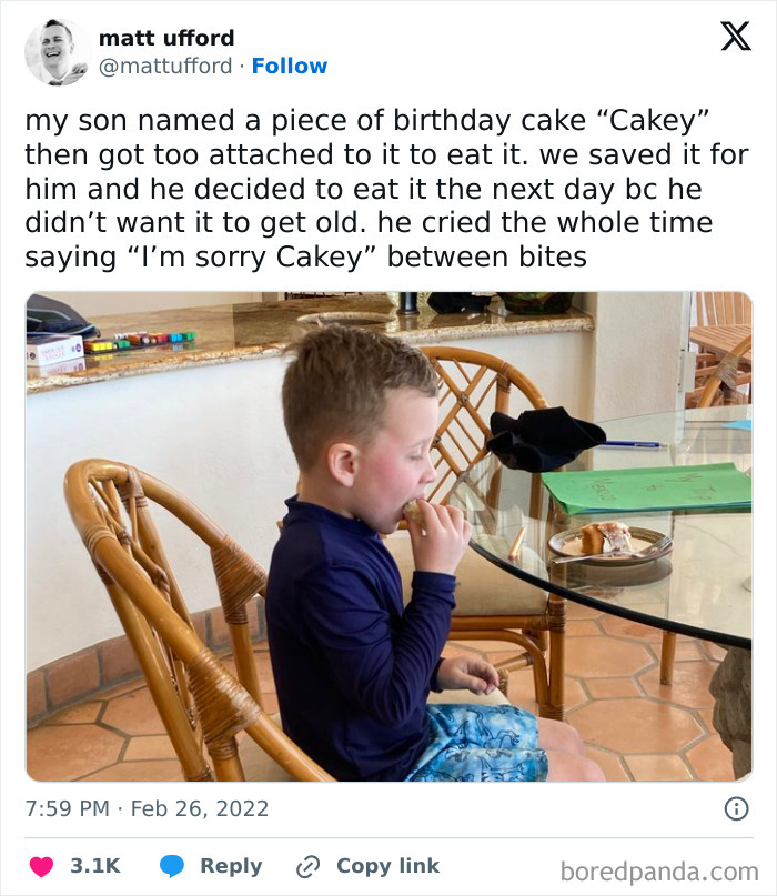 Child reluctantly eating cake, feeling emotional, embodies dumb-clueless-kids concept at dining table.