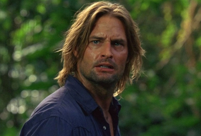 Actor in a forest setting, wearing a blue shirt, representing celebrities who gradually lost fame.