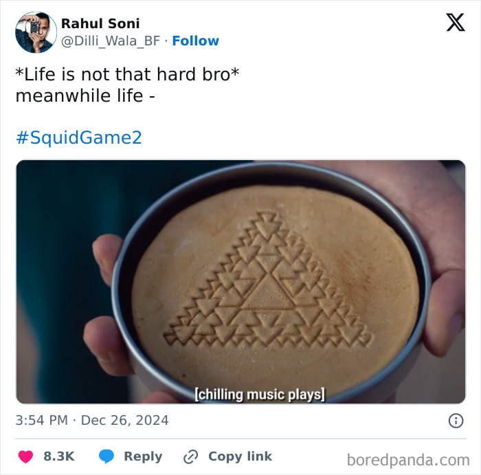 Person holds a honeycomb candy with intricate triangle design, inspired by Squid Game 2 memes.