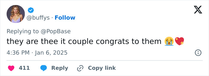 Tweet congratulating a couple on their engagement with heart emojis.