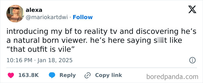 Funny tweet about introducing a boyfriend to reality TV, humorous reaction included.