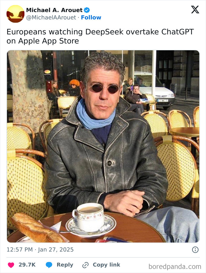 Man in sunglasses enjoying coffee at an outdoor cafe, humorously reacting to DeepSeek's move on AI chatbots.
