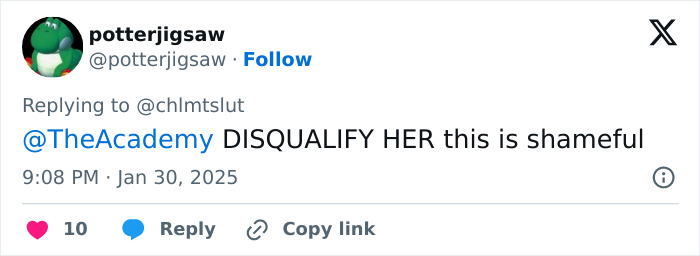 Tweet criticizing transgender Oscar nominee, calling for disqualification due to resurfaced "racist" posts.