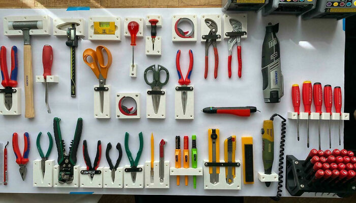 Neatly organized tools on a wall, showcasing next-level organization skills.