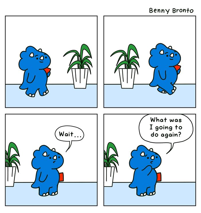 Benny Bronto stands confused by a plant, holding a red book, wondering what he was going to do.