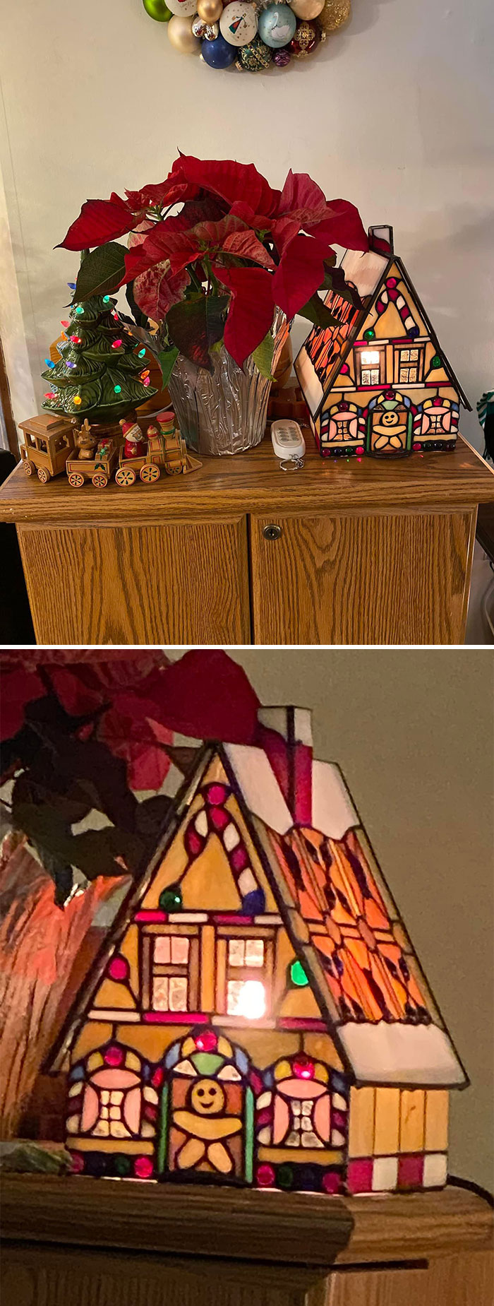Stained glass house lamp and Christmas decor on a wooden cabinet in a secondhand find.