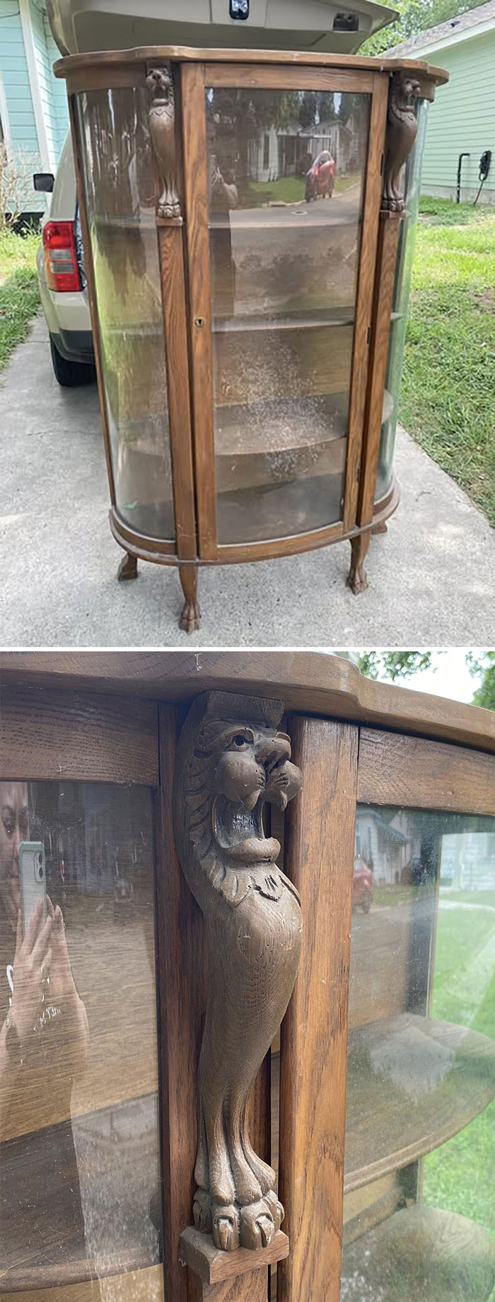 Antique wooden cabinet with glass doors and unique carved lion details, a fascinating secondhand find.