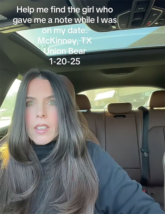 Woman sitting in car, seeking help to find stranger who gave her chilling note on a date. Woman sitting in car, seeking help to find stranger who gave her chilling note on a date.