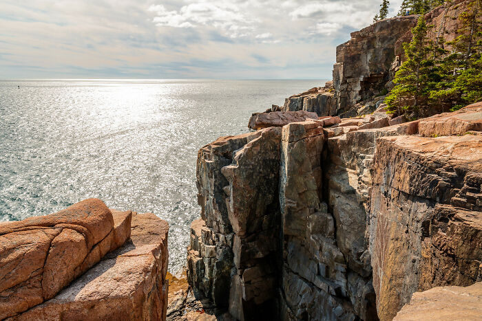 Rocky coastline with stunning ocean views in Acadia National Park, representing amazing views in states.
