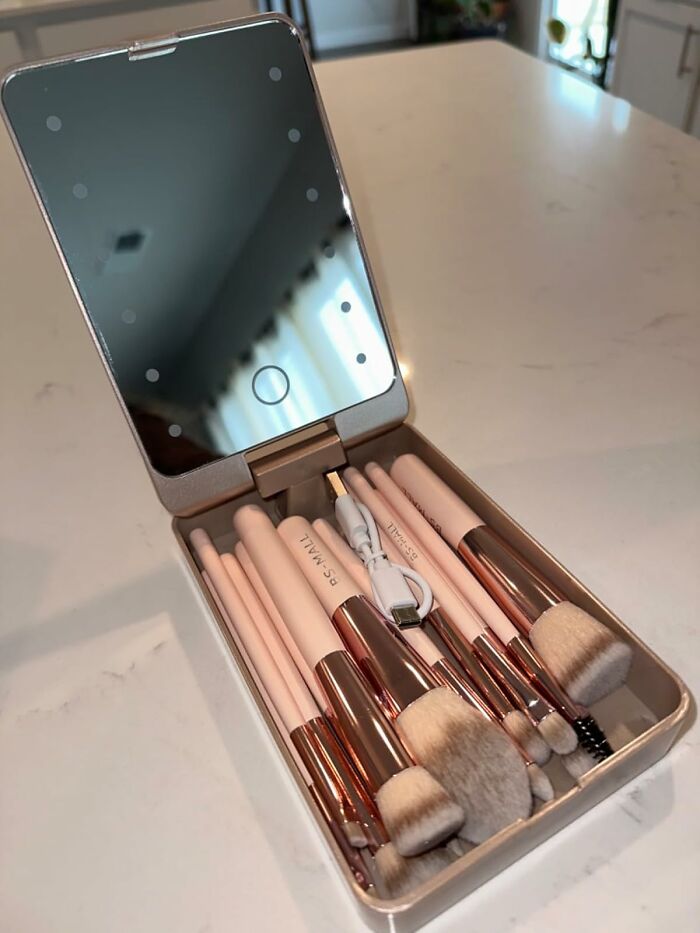 Get Ready For Takeoff With A Travel Makeup Brush Set And Holder That's The Ultimate Wingman (Or Wing-Makeup) For Any Jetsetter, Complete With A Genius LED-Lit Mirror Lid That's Like Having Your Own Personal Glam Squad On The Go
