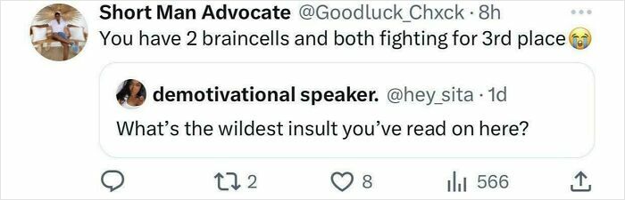 Twitter roast exchange: "You have 2 braincells and both fighting for 3rd place," reply to an insult query.