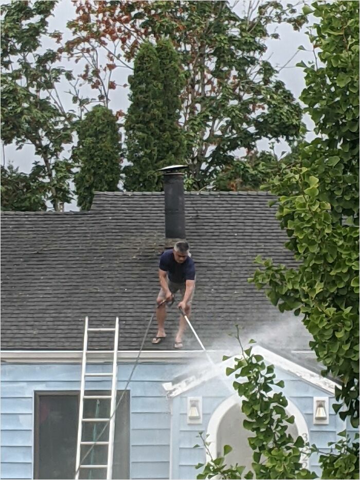 Flip Flops And Leaning Over The Edge Of Roof To Get A Better Angle