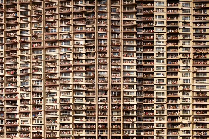Dense high-rise apartments illustrating the symphonic chaos of modernity.